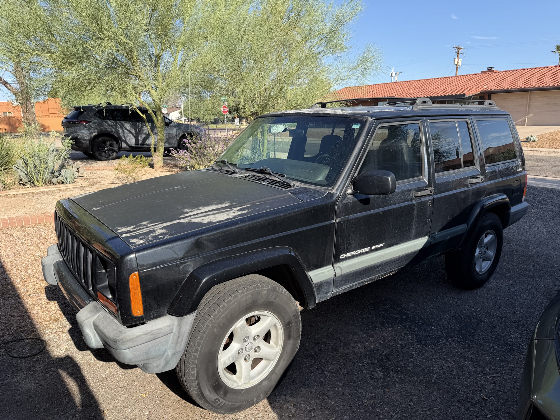 Kessel Run, the original dark blue 2000 Jeep Cherokee Sport